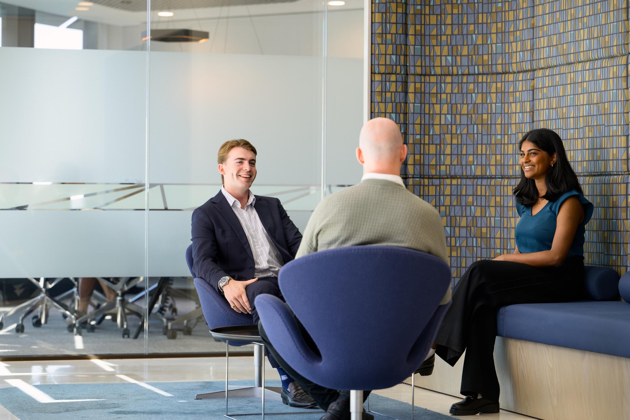 Three colleagues in a discussion